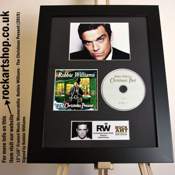 ROBBIE WILLIAMS SIGNED THE CHRISTMAS PRESENT AUTOGRAPHED